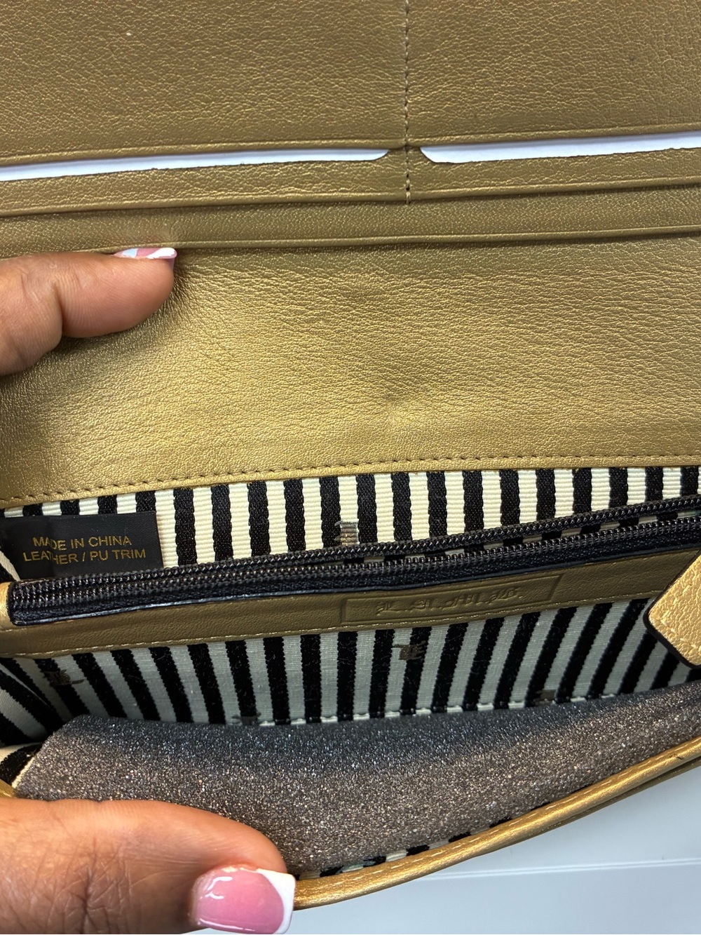 L.A.M.B Gold Embossed Leather Clutch with Black & White Stripe - Picture 4 of 8